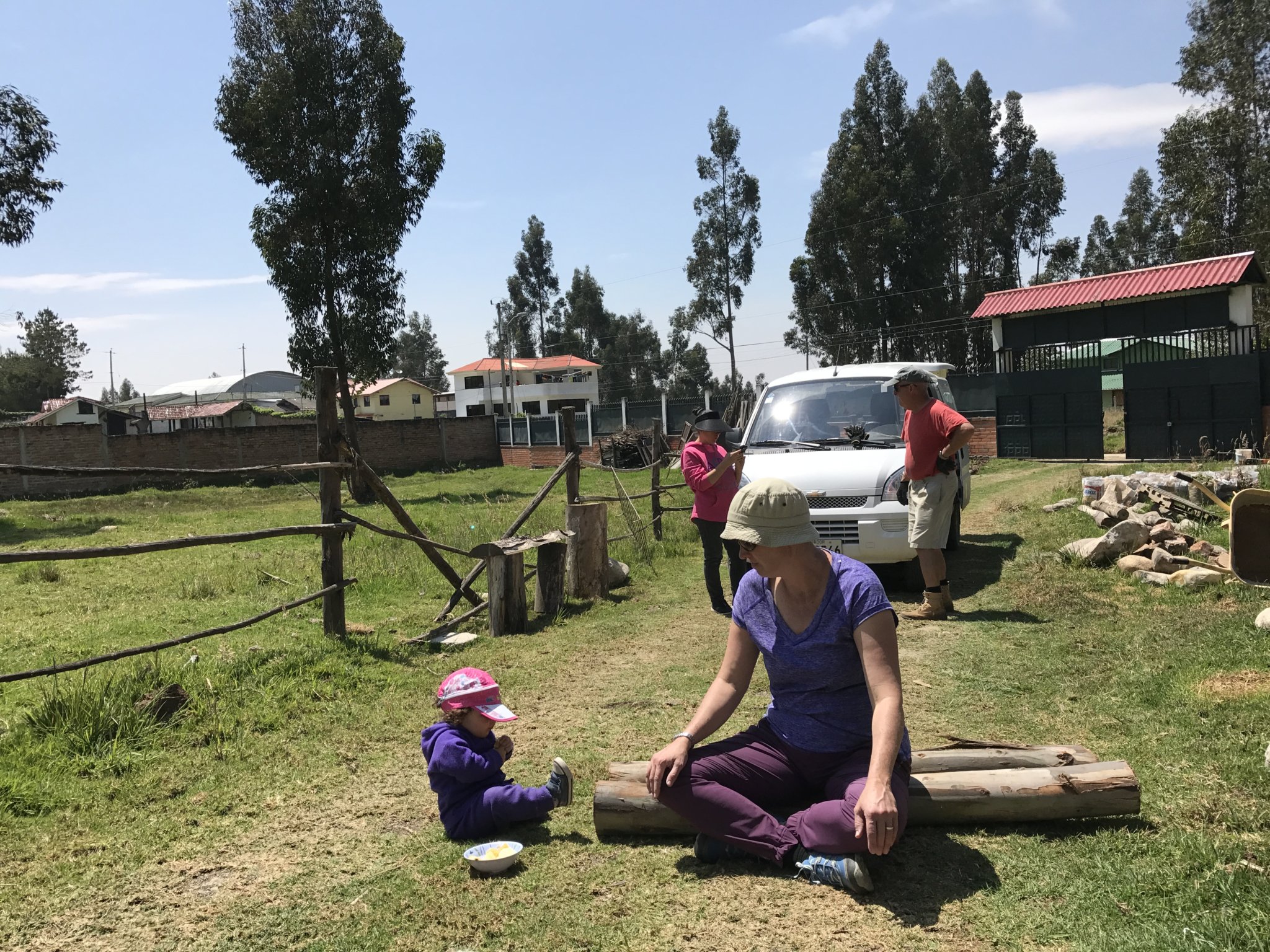 Amelie offers support as Leigh and I start on our main task of building a goat pen fence from Eucalyptus