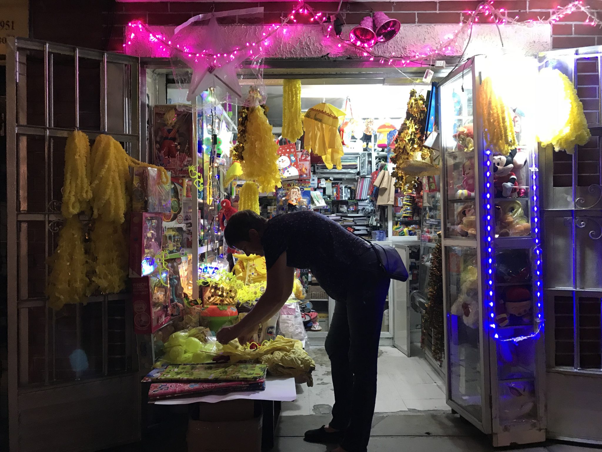 Leigh shops for "lucky New Year's yellow underwear" in Lima, Peru