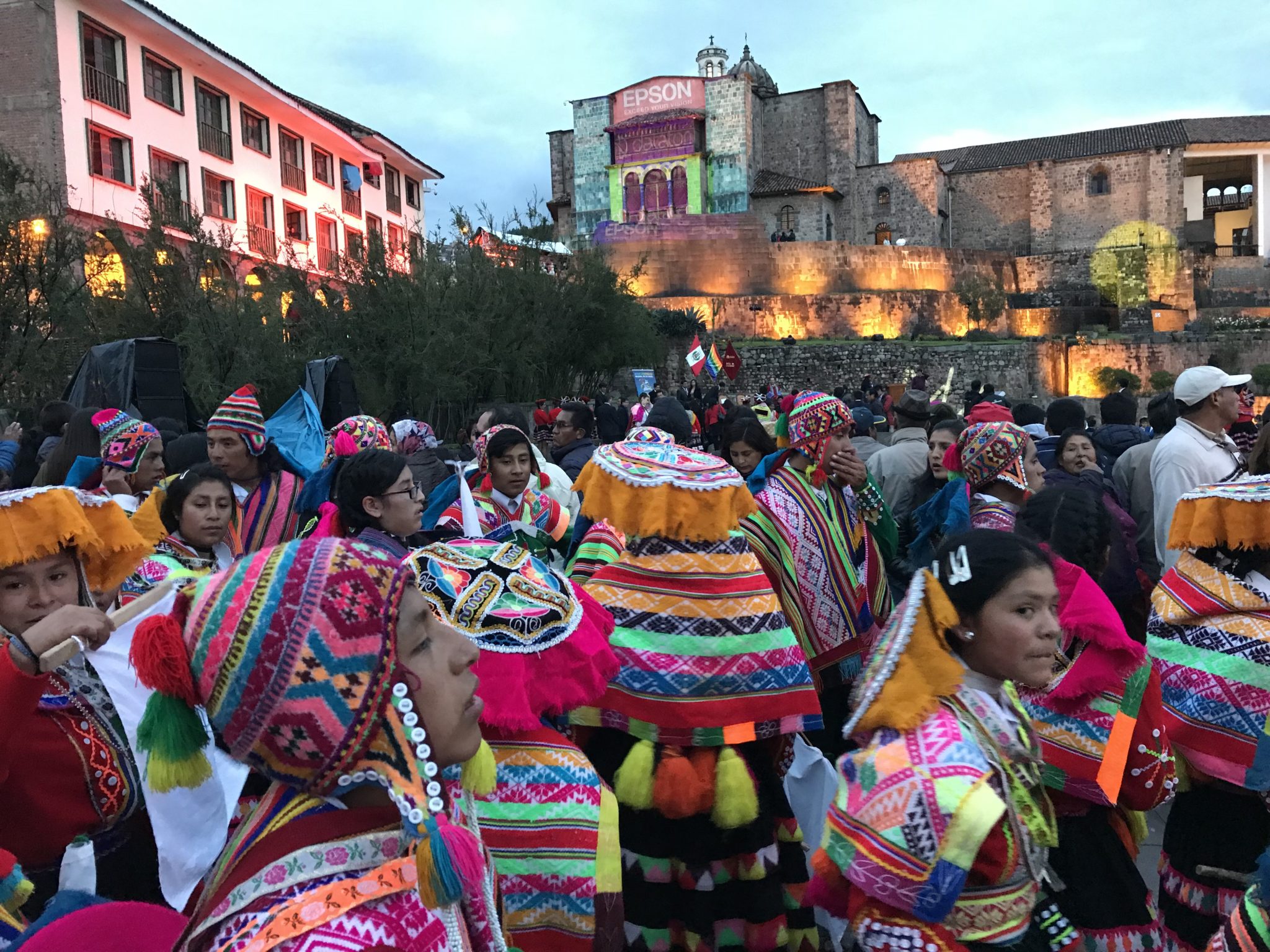 Procession in front of Qorikancha, Cuzco, Peru